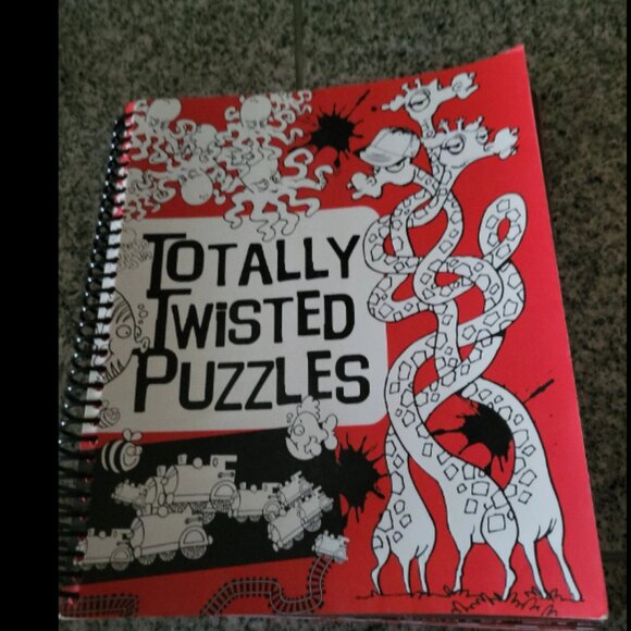 Other - Totally twisted puzzles. Book
